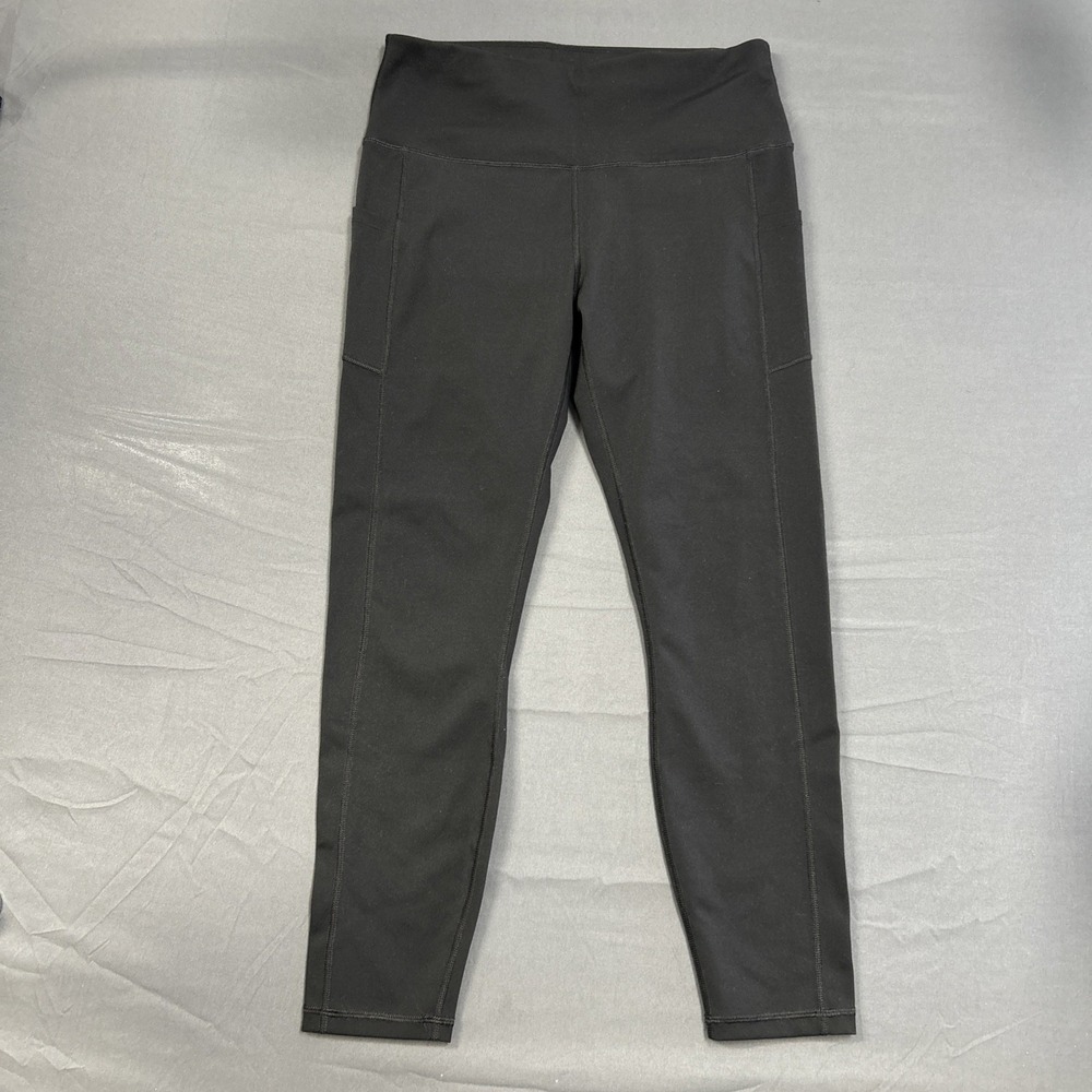 black athletic leggings from a brand possibly named "Fengbay"  Size L Leggings